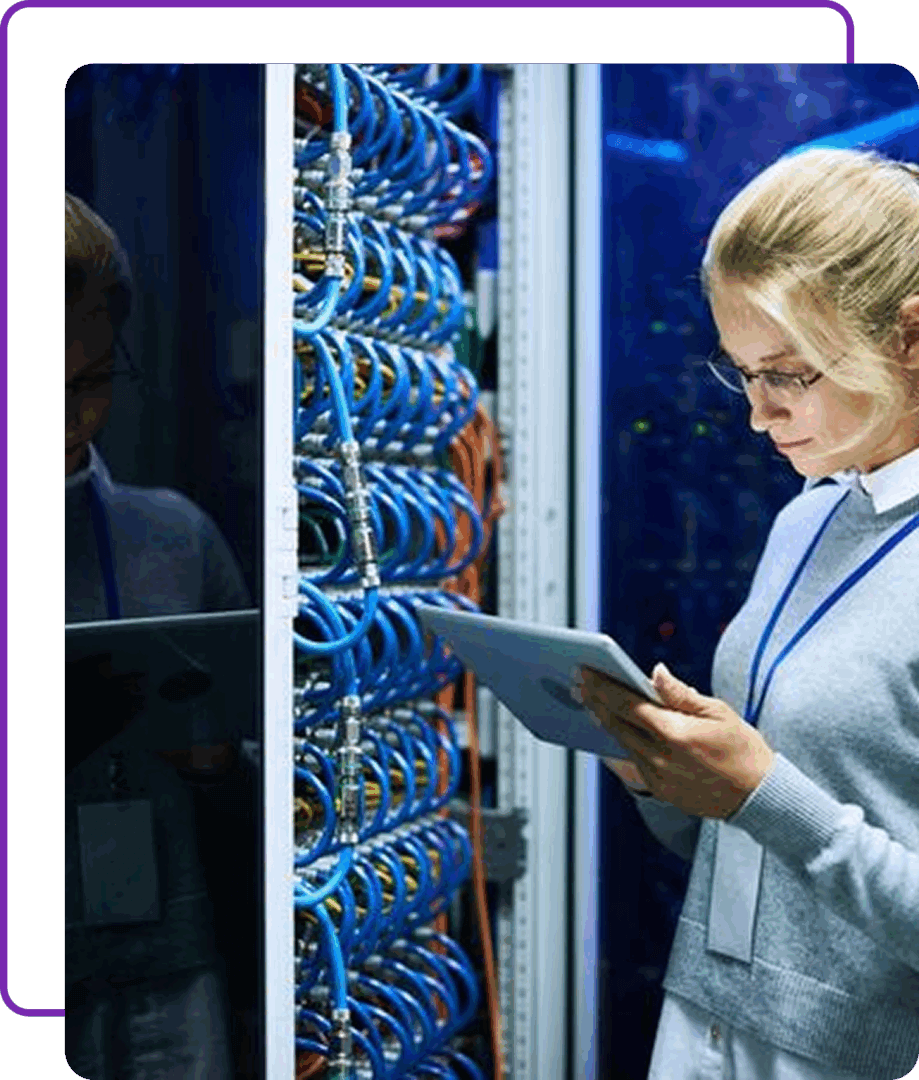 Woman working with server cables and tablet.